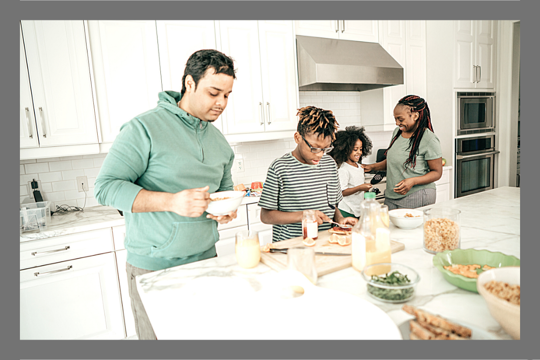 Parents and teens gathered in the kitchen