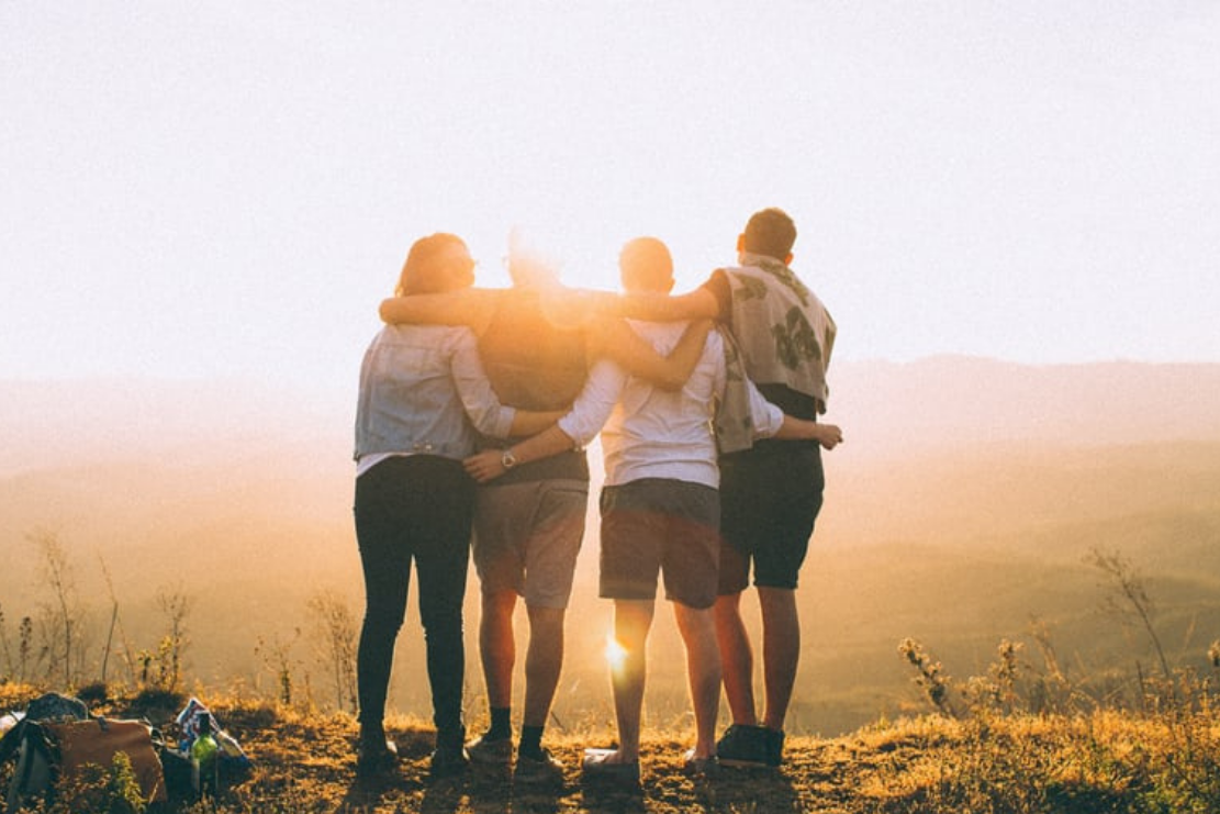 family looking at sunset