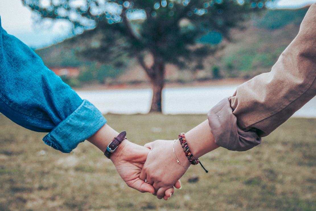 couple holding hands